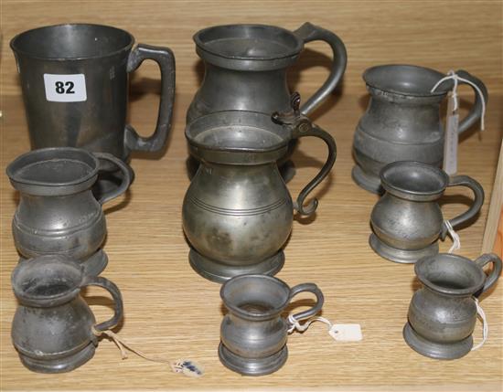 A collection twelve various 18th / 19th century pewter tankards